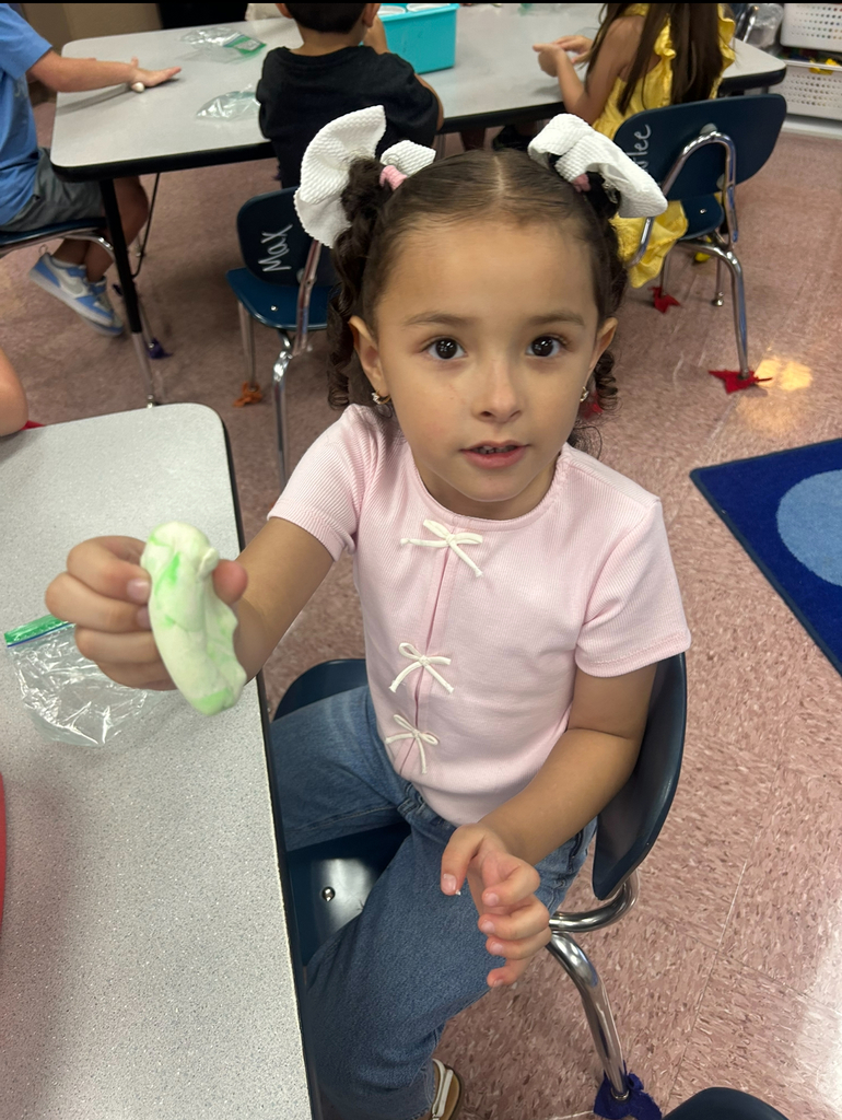 student playing with magic play-doh