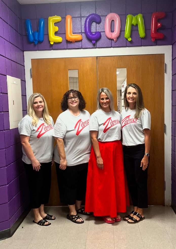 second grade teachers posing for photo 