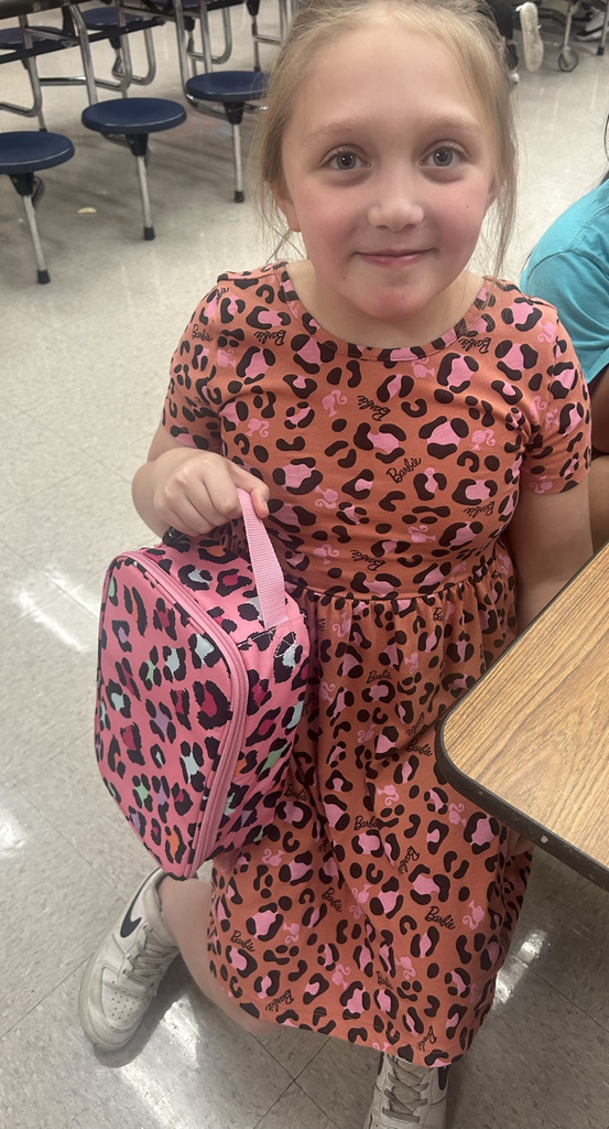 student matching her lunch pail