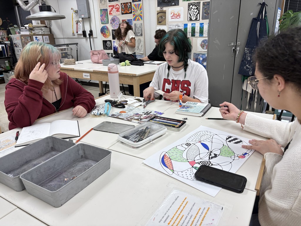 Students working on projects in Art Open Studio