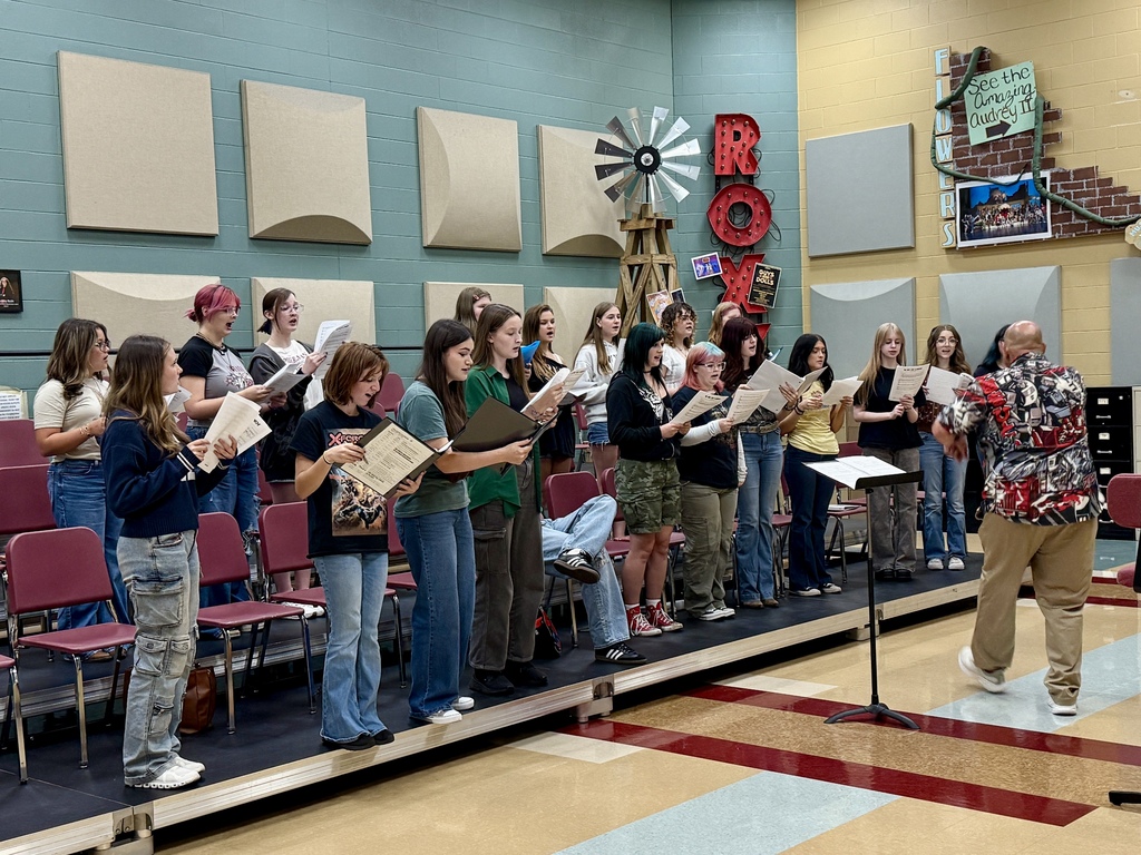 Students learning new choral music for the new school year