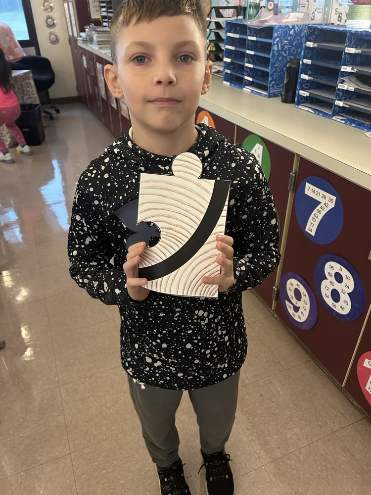 student with colored puzzle piece 