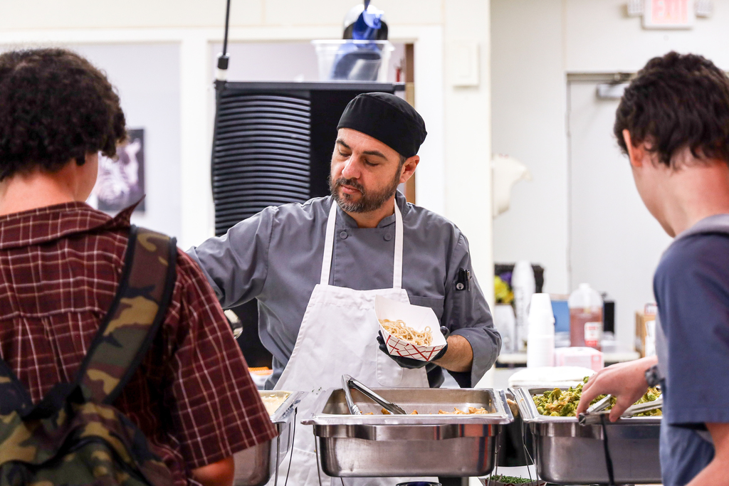 Chef Ryan serving students