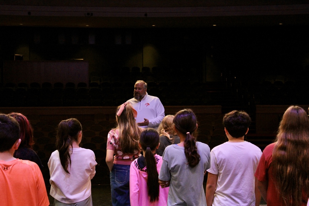 Dr. Adkins talking to jr high students