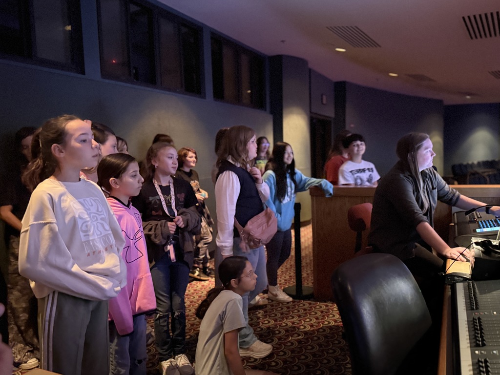 Students learning about the sound and light boards