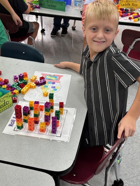 students playing with number blocks 