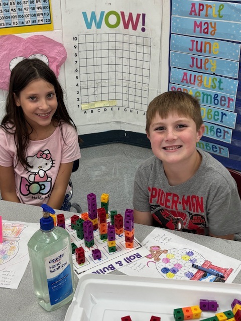 students playing with number blocks 