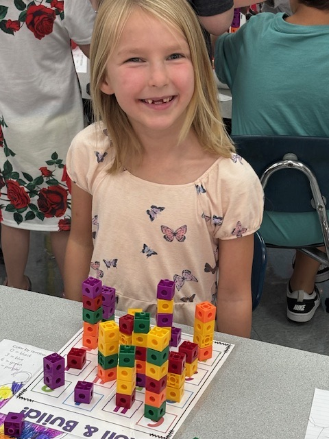 students playing with number blocks 