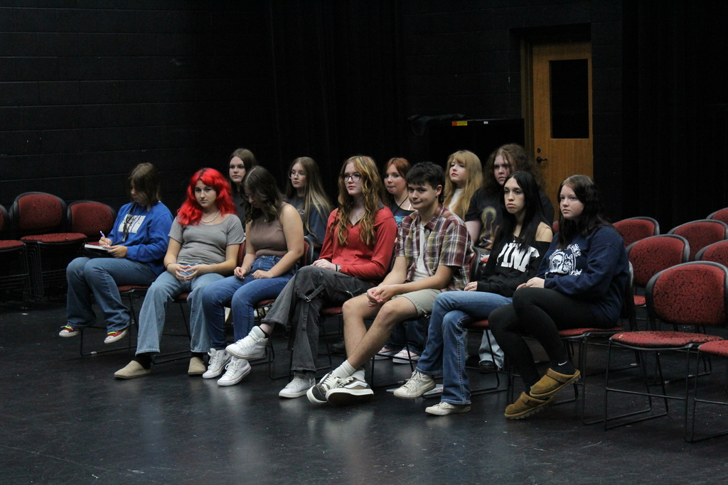 Students watching students perform 