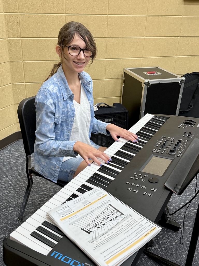 Jr High Jazz student playing the piano