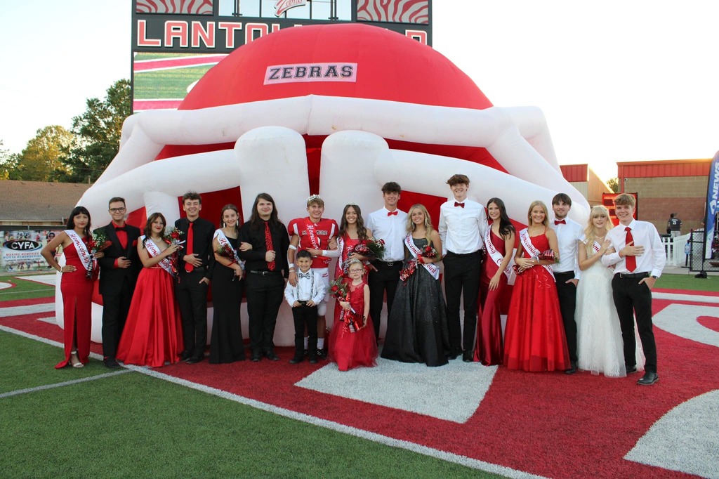 HOMECOMING COURT WITH PRINCE AND PRINCESS