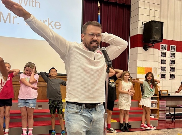 Mr. Burke does the Sprinkler