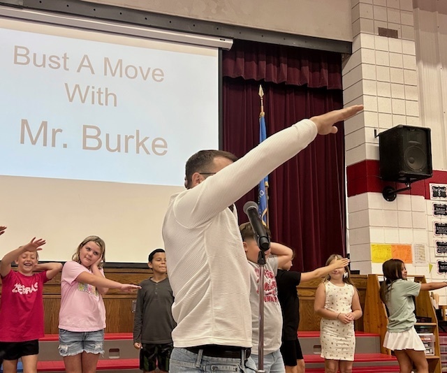 Mr. Burke does the Sprinkler