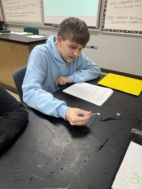 Our Biology students explored one of water’s most fascinating properties—cohesion—by testing how many drops could balance on the head of a coin. They compared plain water to soapy water, discovering firsthand how molecules stick together. 🌍  Not only did this investigation show why cohesion is so important to life on Earth, but it also required teamwork, precision, and careful observation