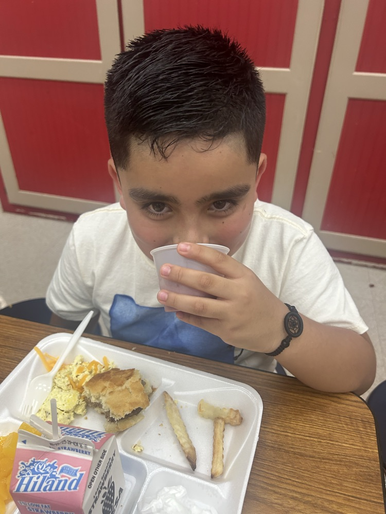 student trying smoothie