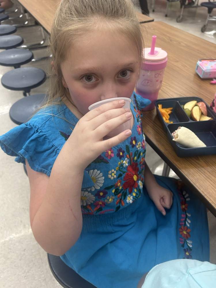 student trying smoothie