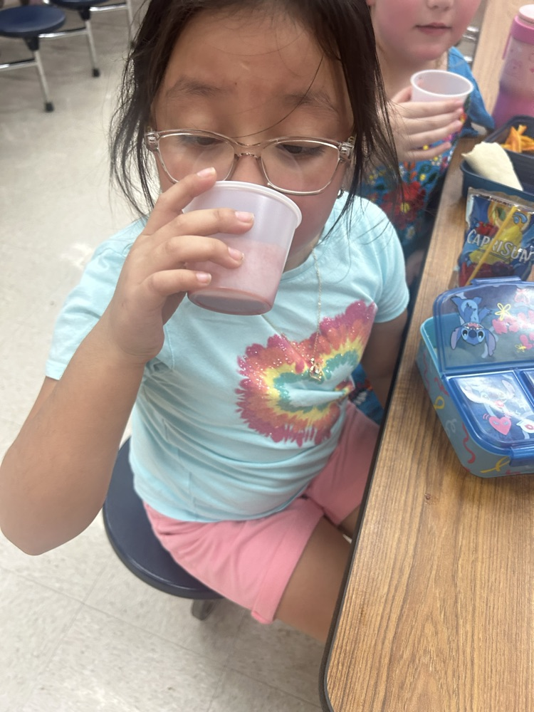 student trying smoothie