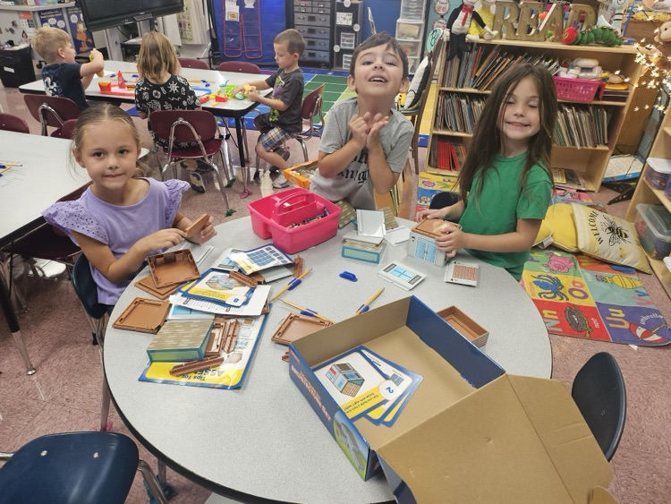 students learning about house building 