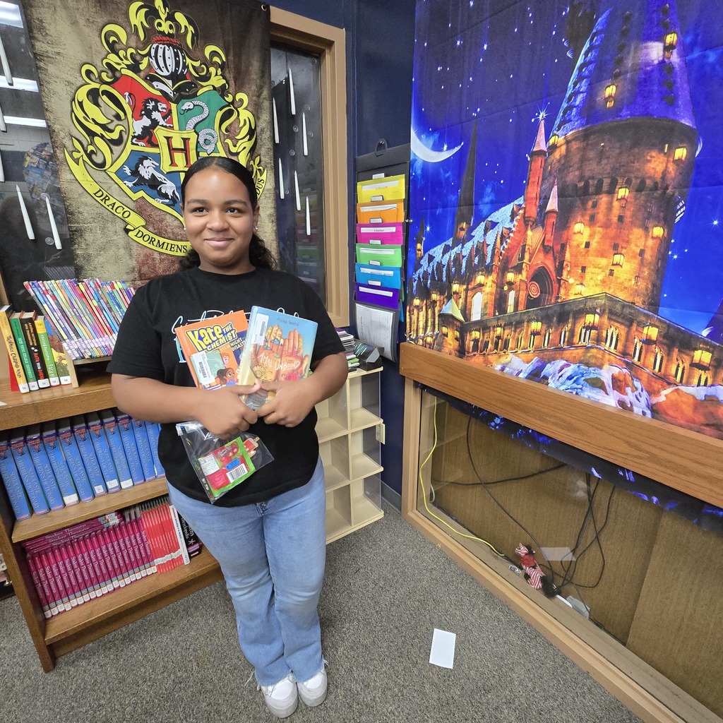 Student holding books