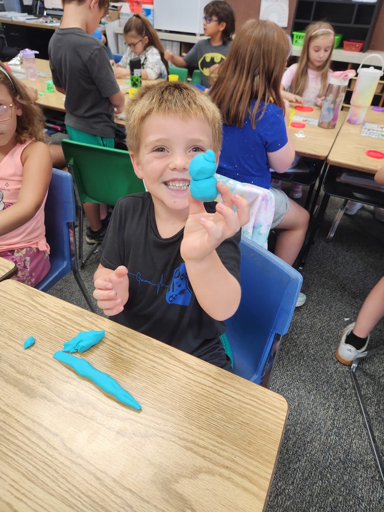 students playing with playdoh