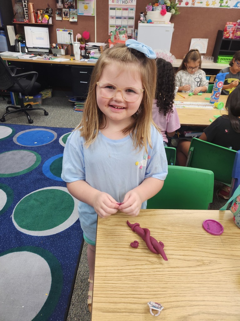 students playing with playdoh