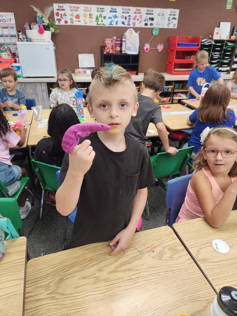 students playing with playdoh