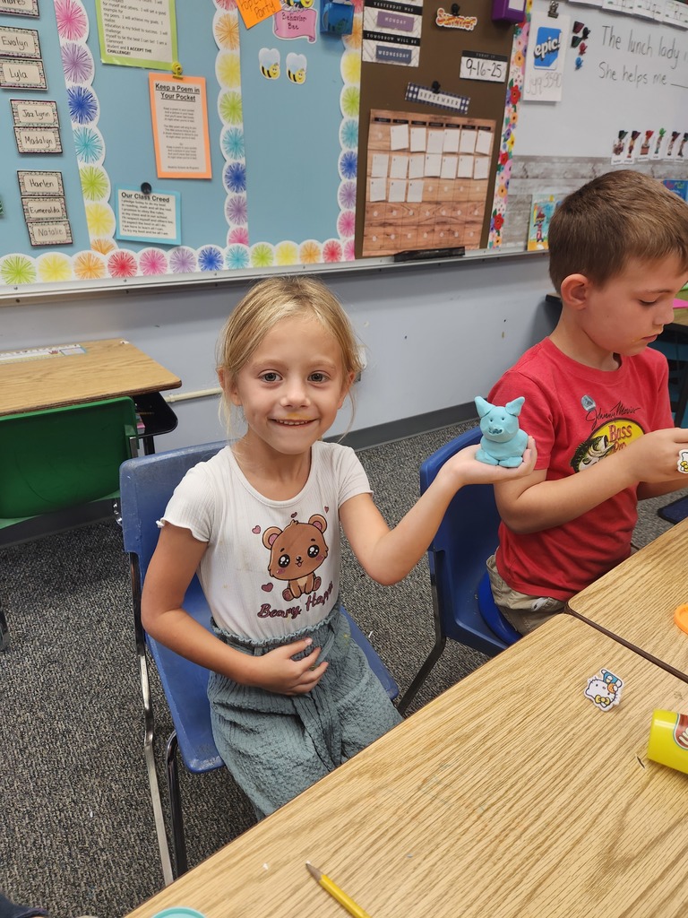 students playing with playdoh