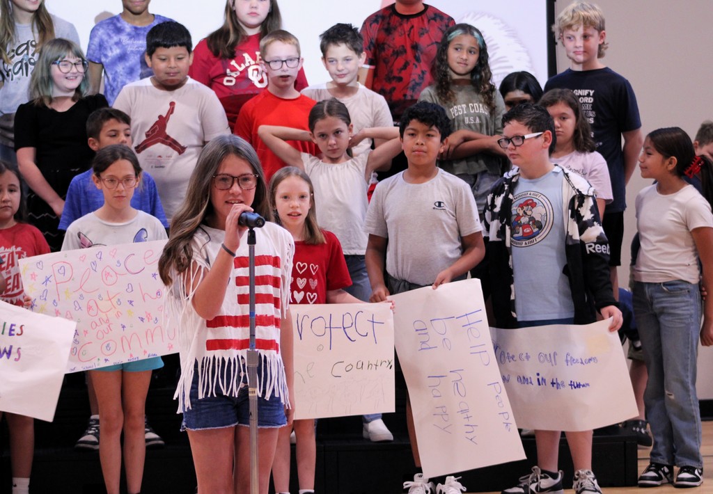 student speaking in microphone