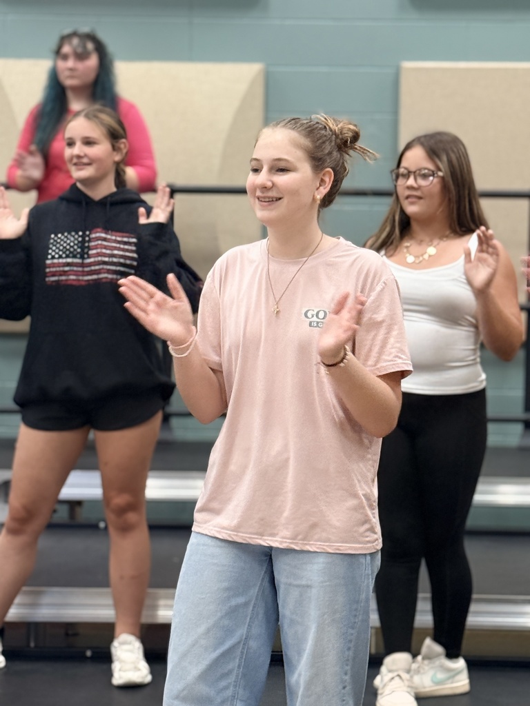 Clapping along with the music in show choir