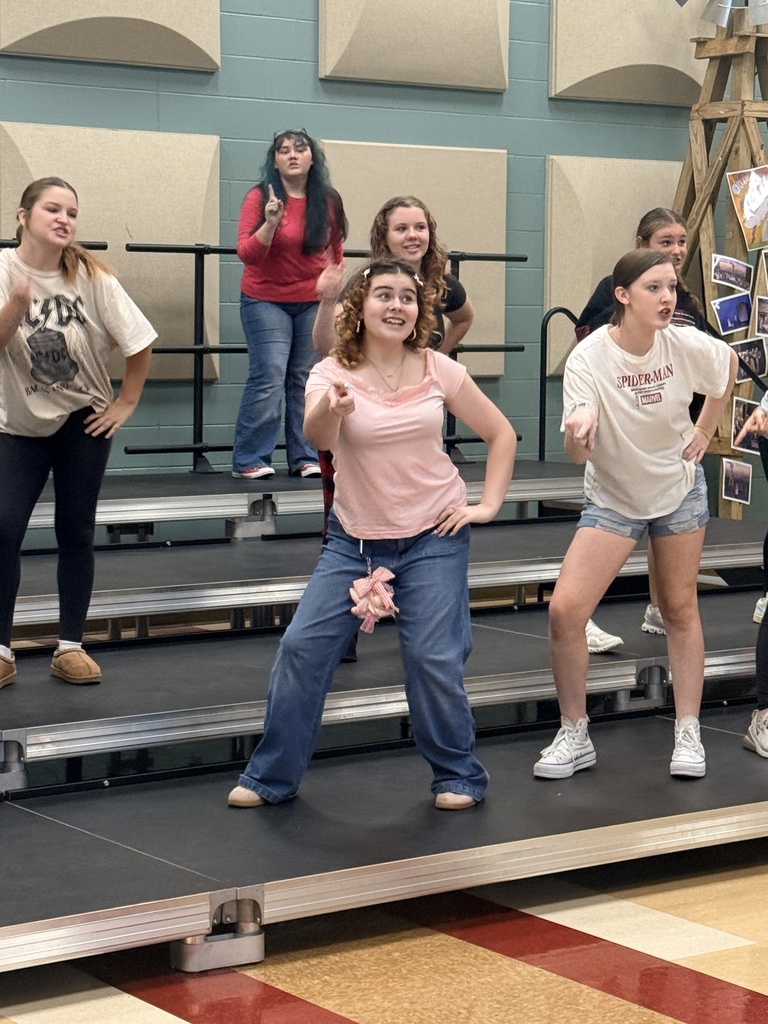 Students working on their show