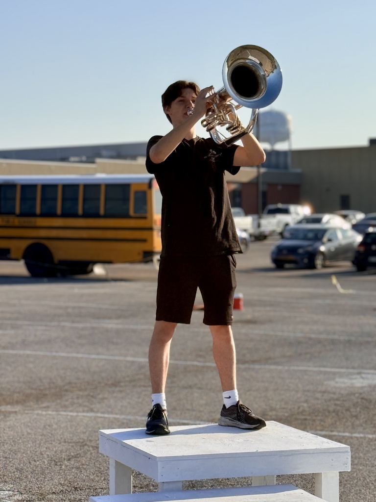 Baritone player on a stand playing a solo