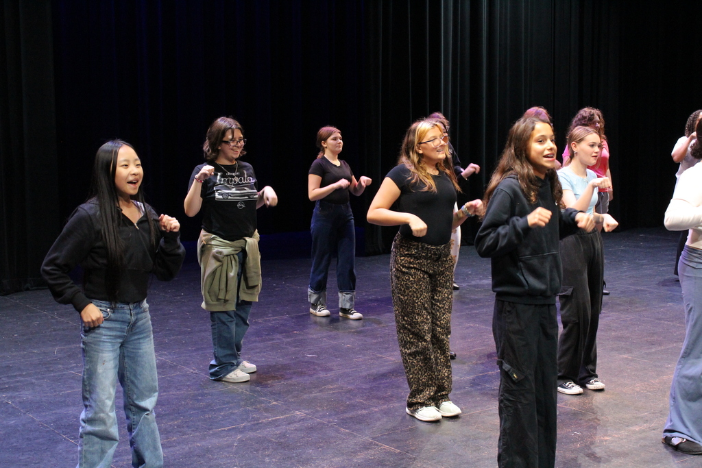 Students working on their show choir show