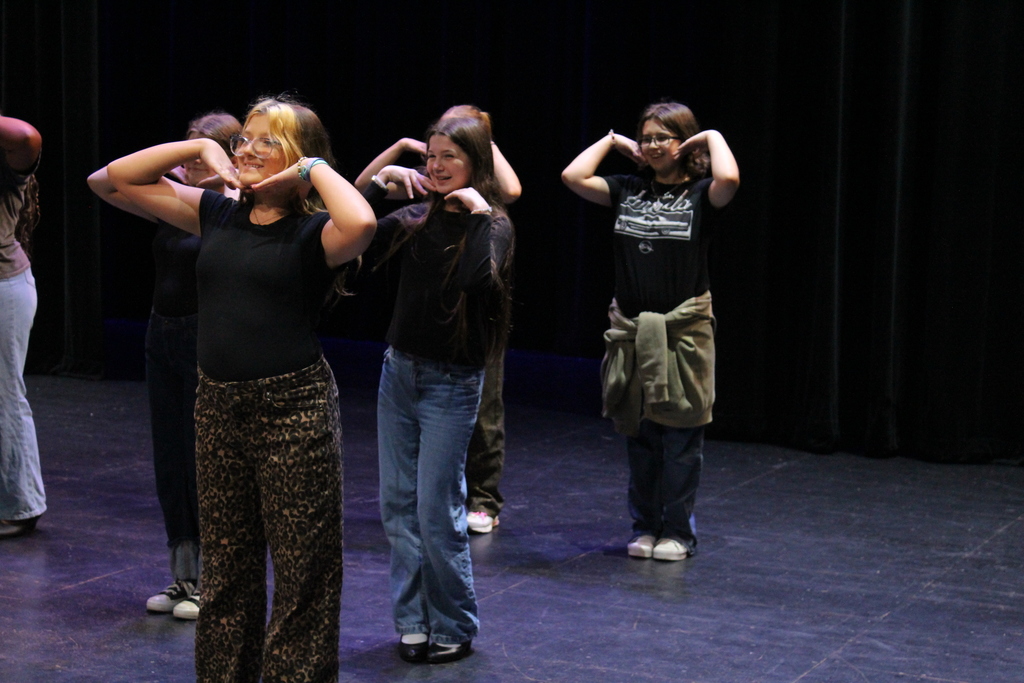 Students showing emotion and working on their moves