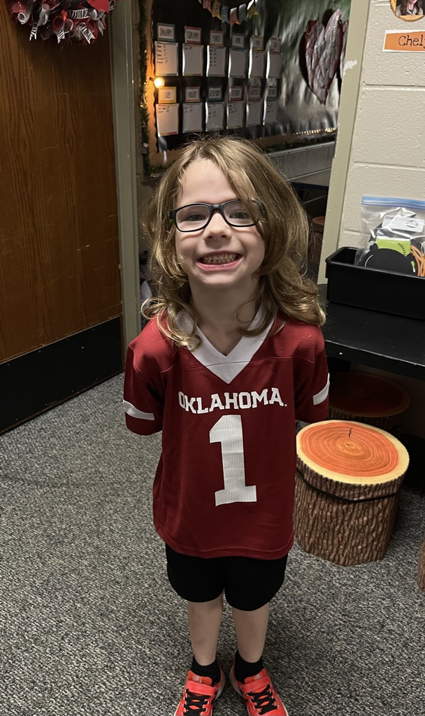 student dressed in college gear 