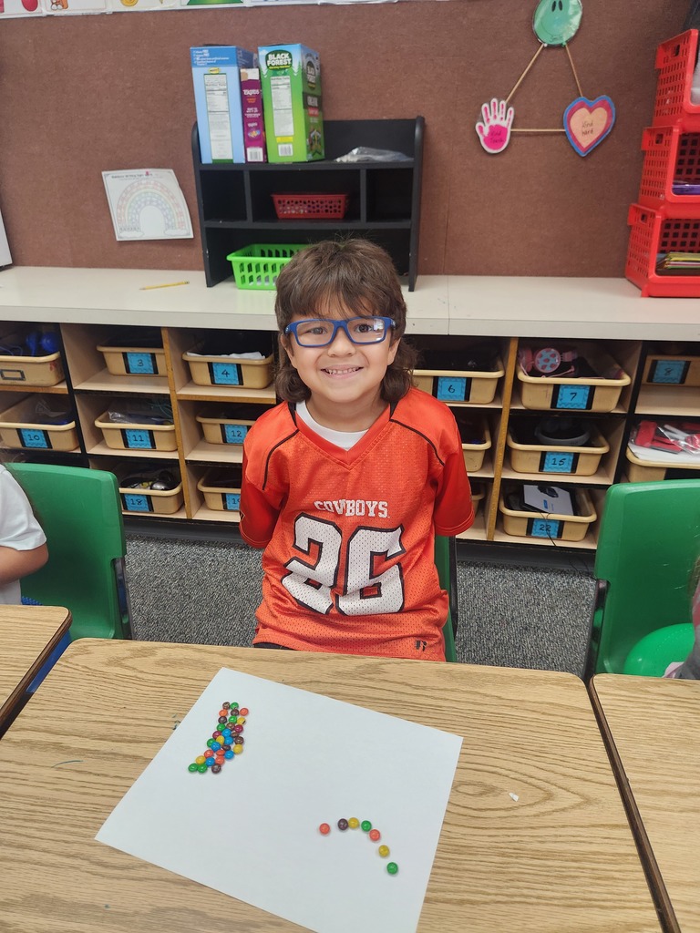 Student counting m&m's