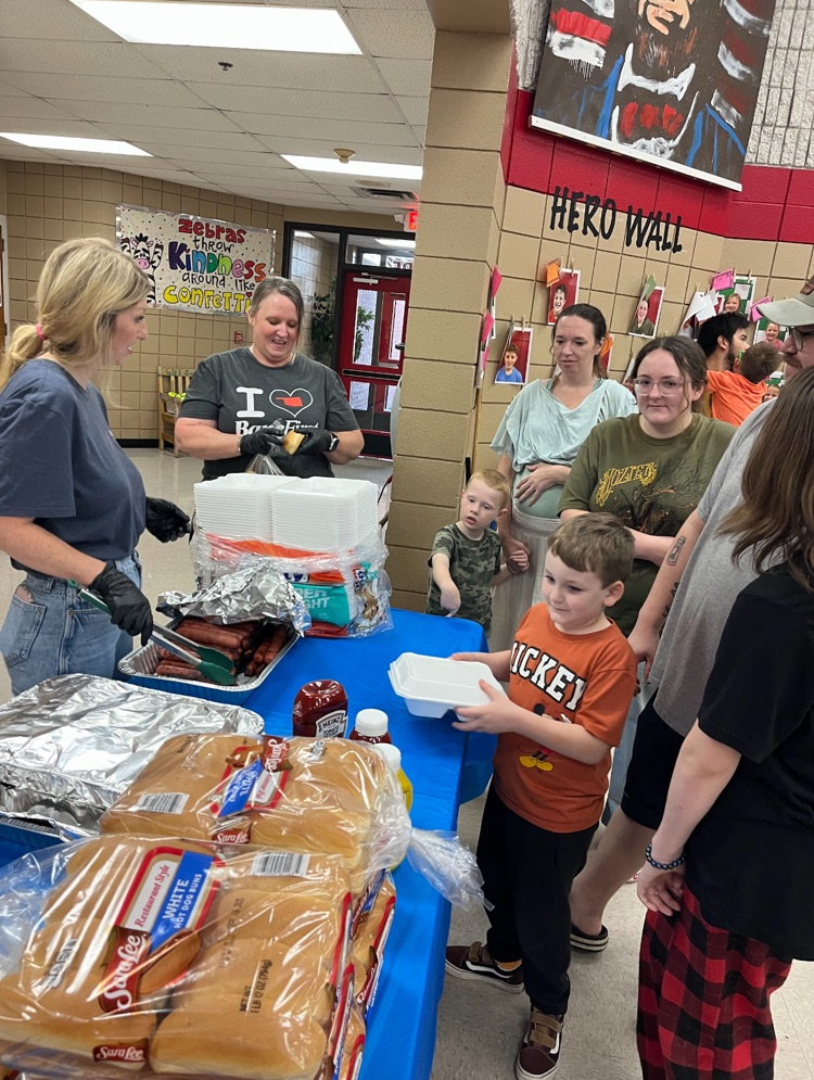 serving hot dogs