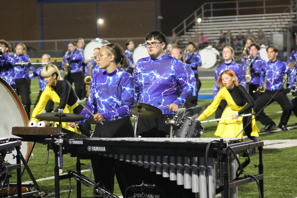 Students playing and marching in the band