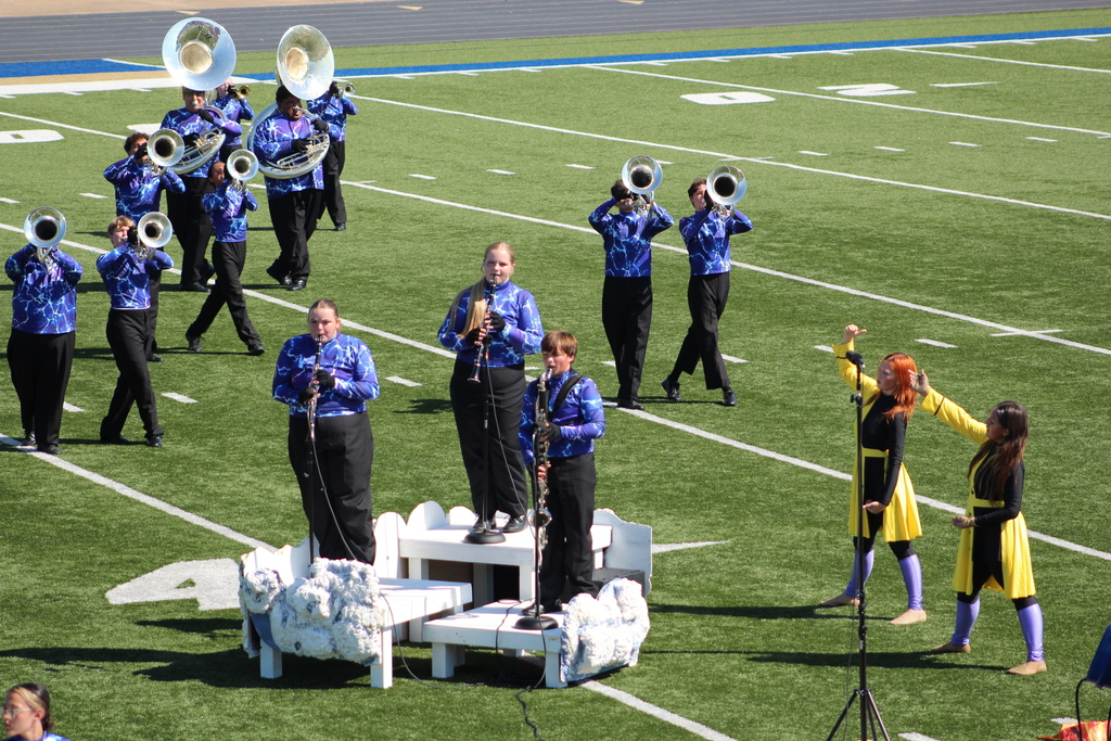 Students playing in trio during the marching show
