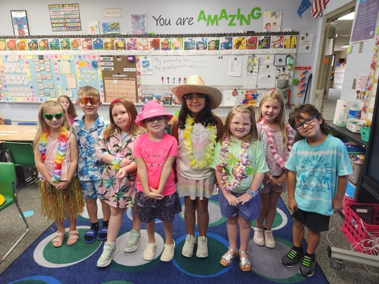 students dressed in Hawaiian gear