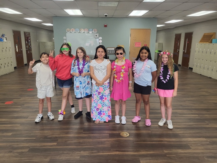 students dressed in Hawaiian gear
