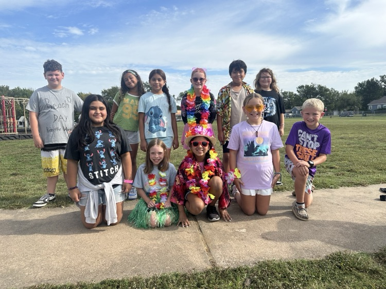 students dressed in Hawaiian gear