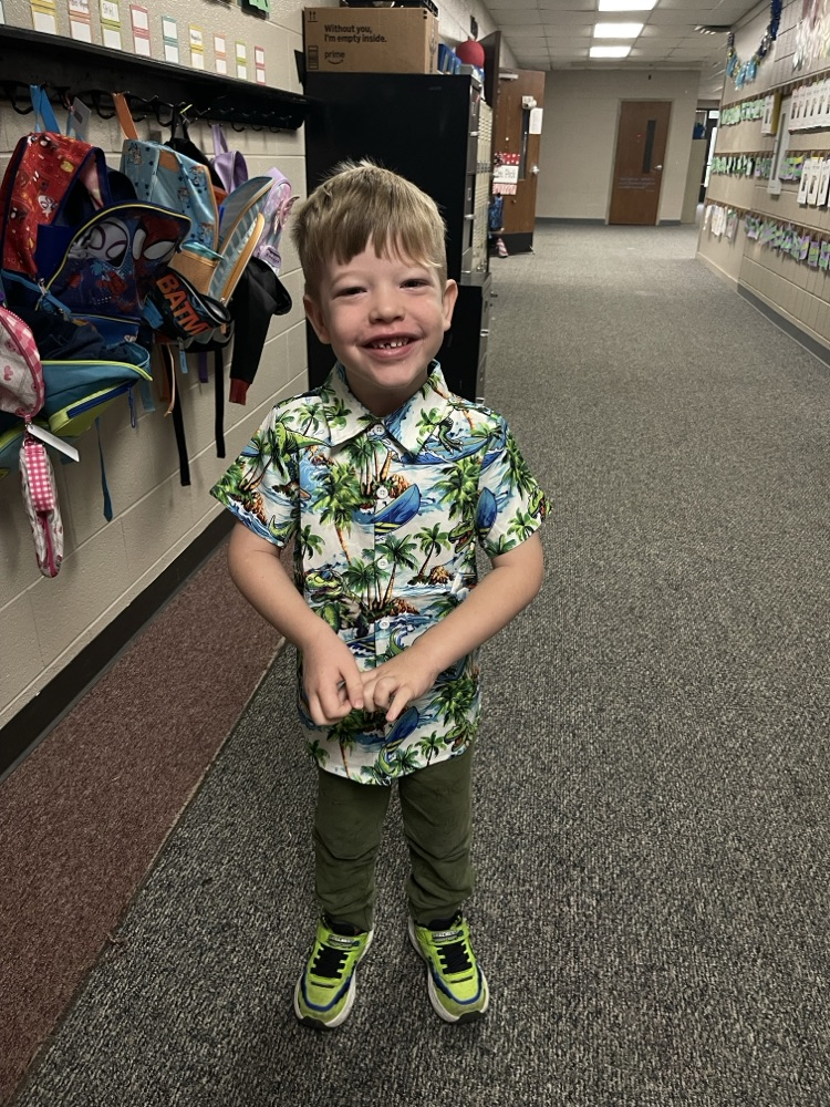 students dressed in Hawaiian gear