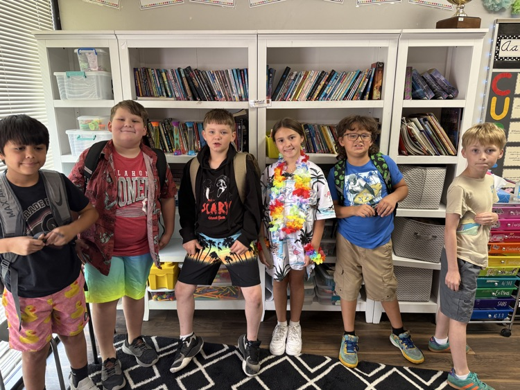 students dressed in Hawaiian gear