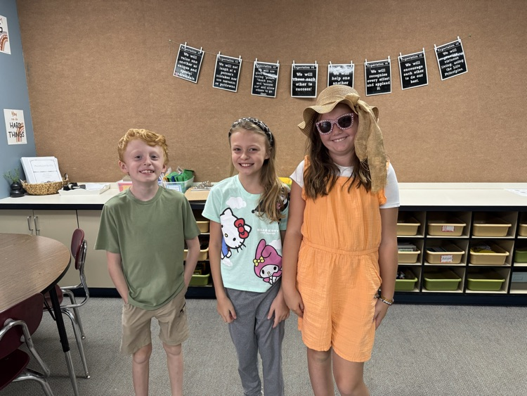 students dressed in Hawaiian gear