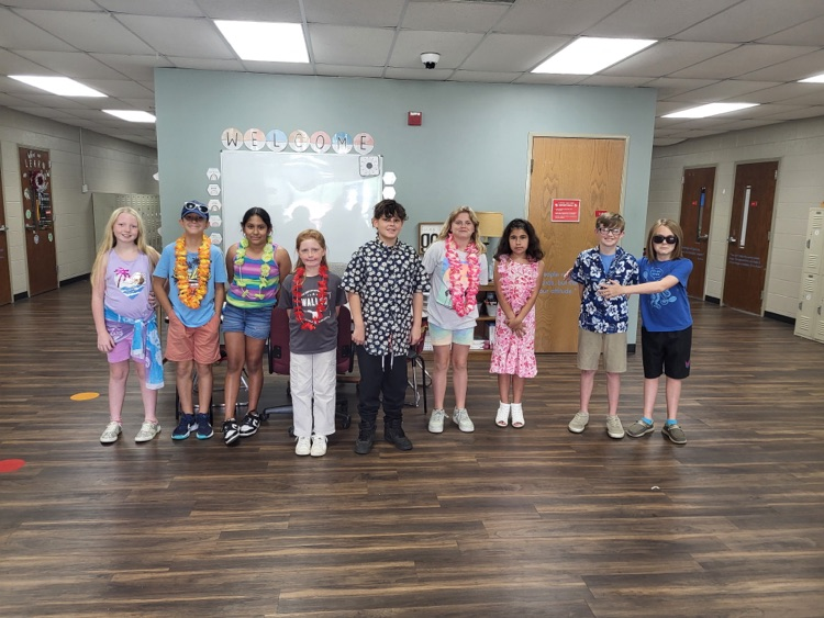 students dressed in Hawaiian gear