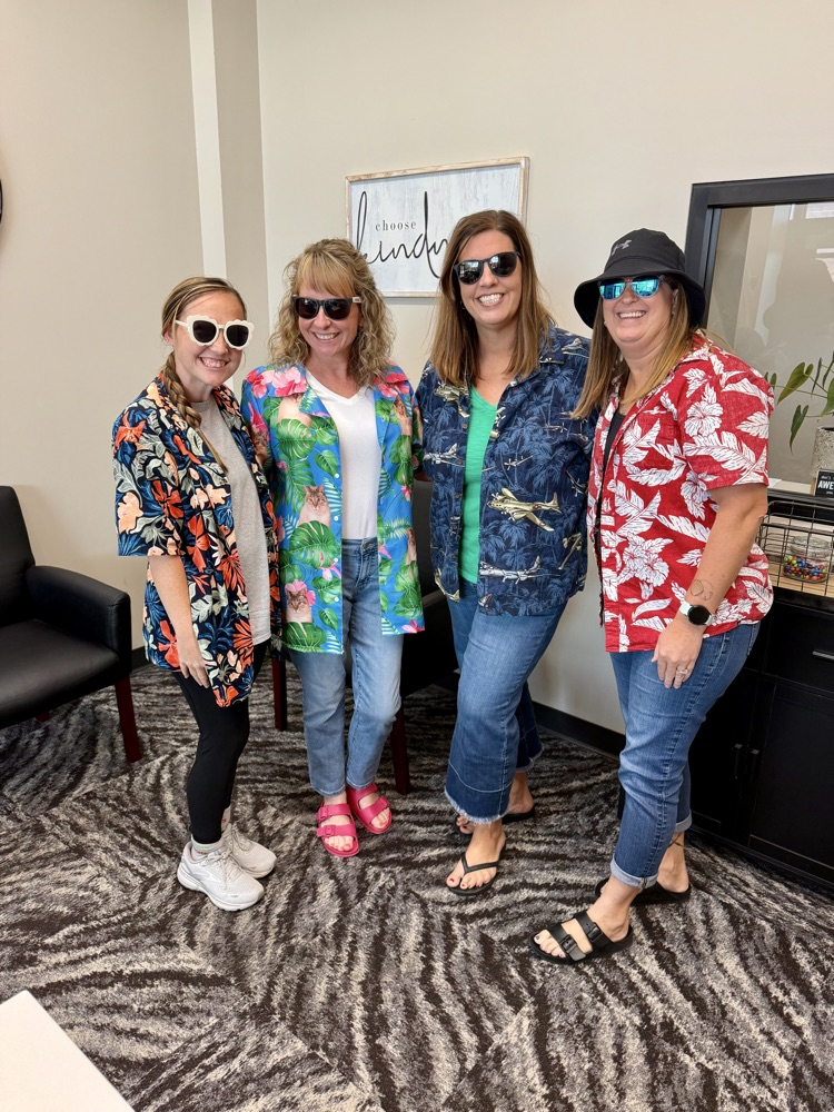staff dressed in Hawaiian gear
