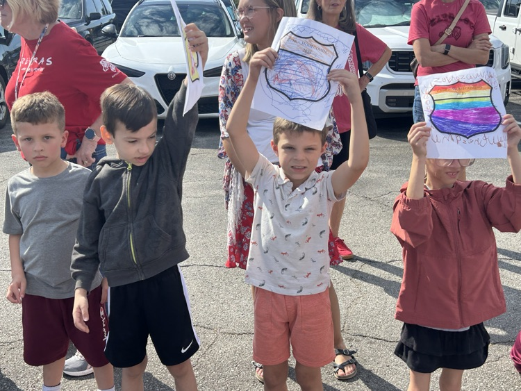 students with signs