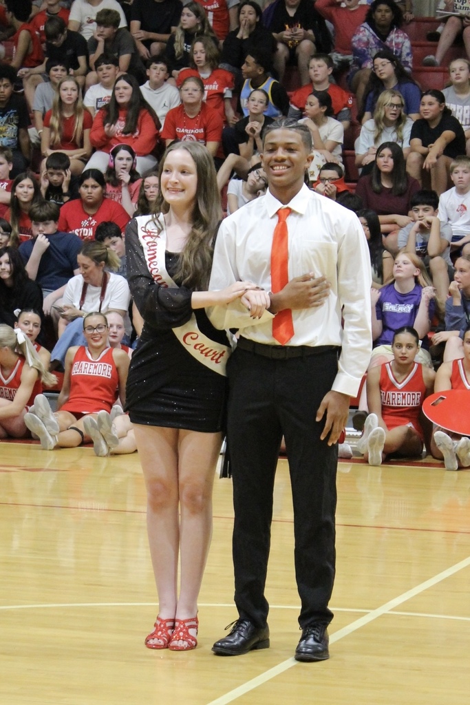 Choir student with her escort for Homecoming.