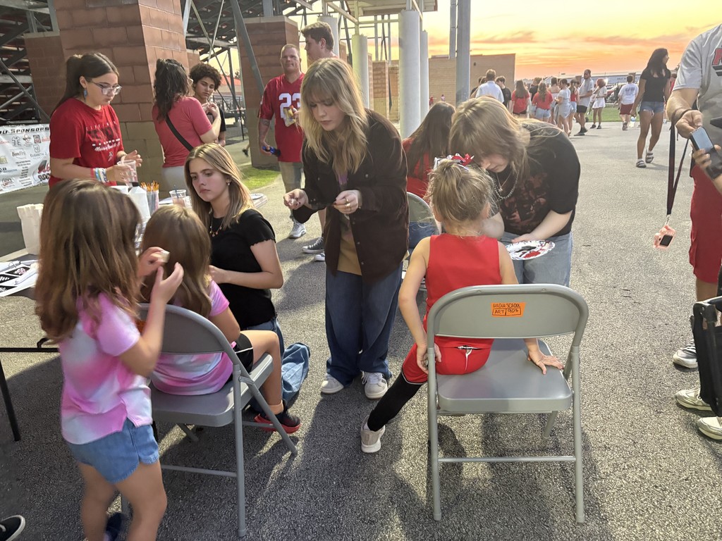Face painting at the football game.