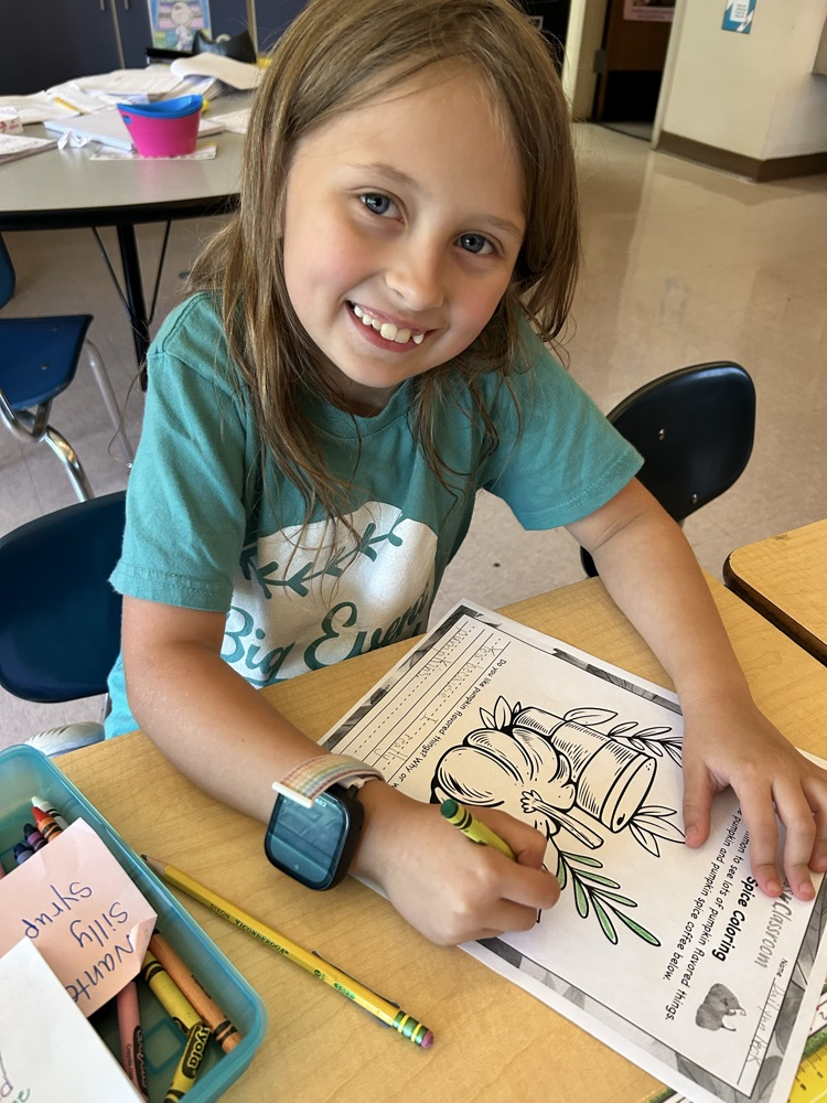 student learning about pumpkins